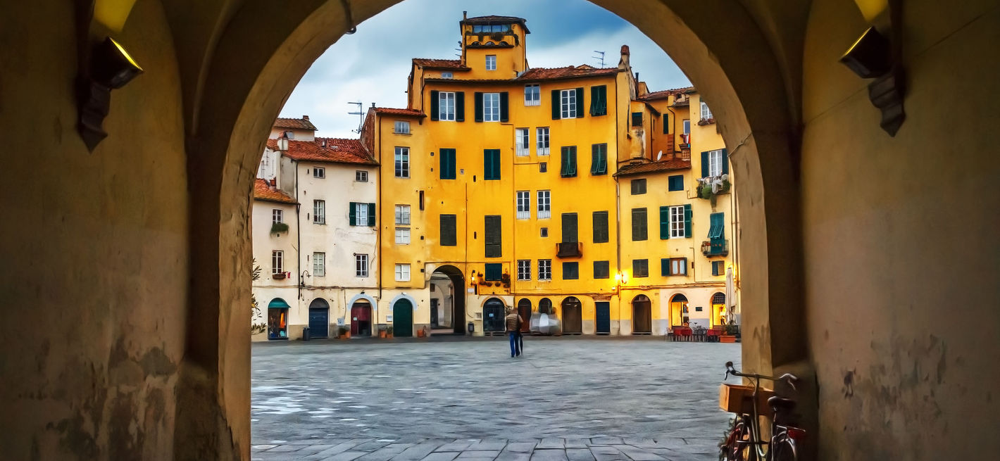 Piazza dell’Anfiteatro in Lucca, Italy © Adobe Stock