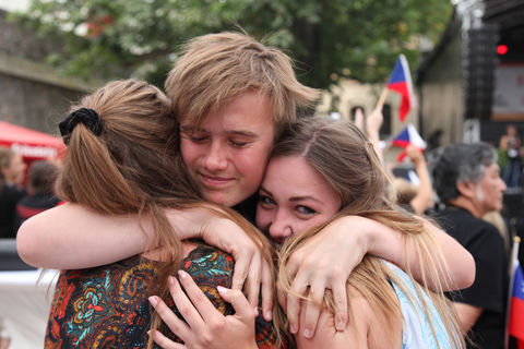 Singers lying in their arms