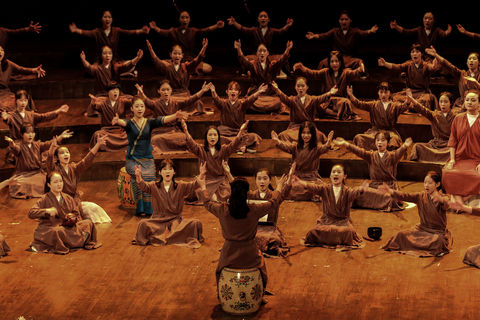 Chinese choir performing on stage 