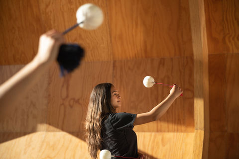 Maori woman dancing with a poi © Auckland Tamaki Makaurau